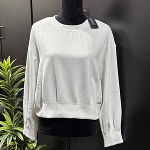 Badgley Mischka Short length,pleated hemline & cuffs,metallic threading,pullover